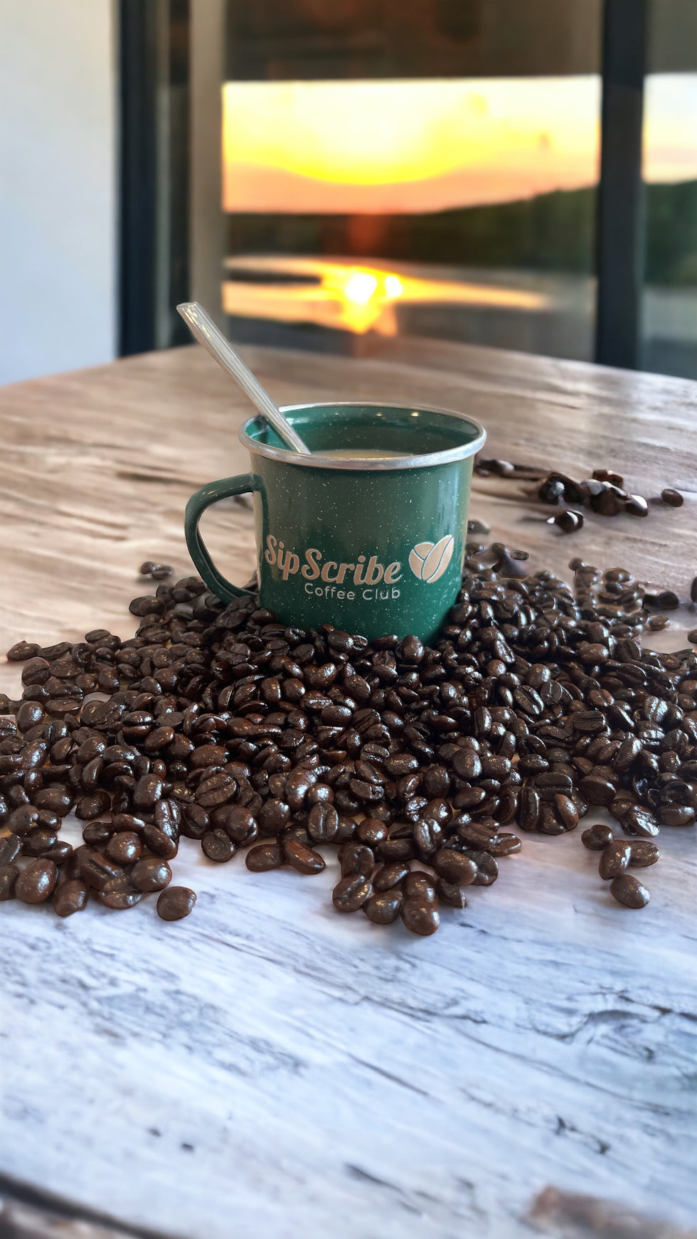Green mug surrounded by coffee beans from SipScribe, a Coffee Subscription service in Canada